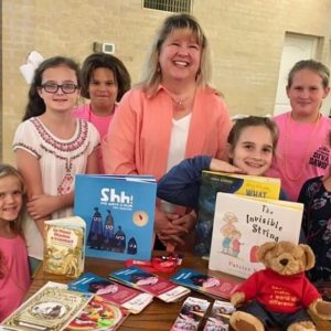 Hold a Book and Fund Drive